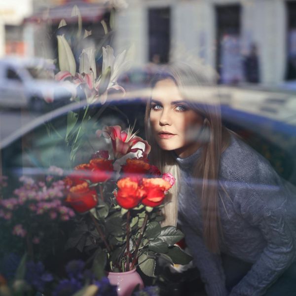 Person feeling energetic and refreshed, looking towards a bright window.